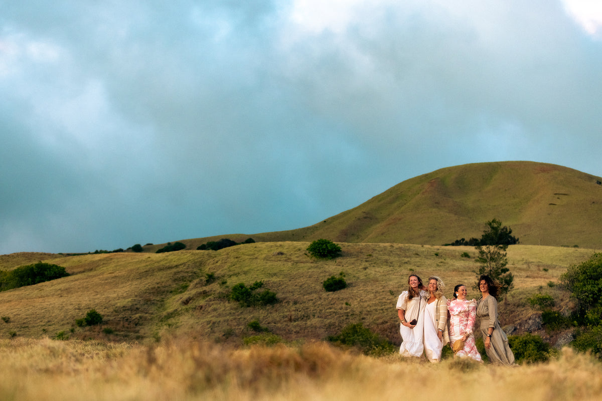 Four generations of the Darnall ohana walking the pasture above the farm